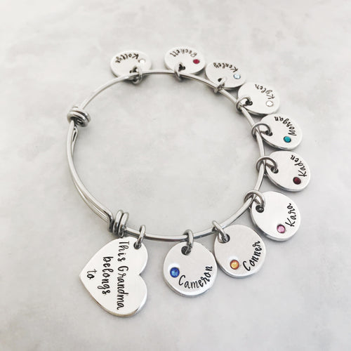 “This mom belongs to”...custom embedded birthstone charm bracelet