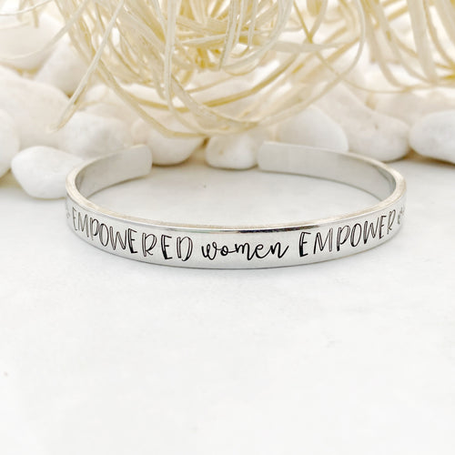 “Empowered women empower women” cuff