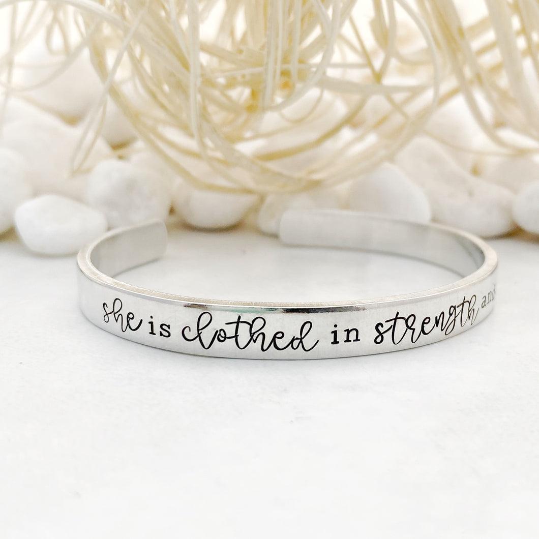 “She is clothed in strength and dignity” cuff